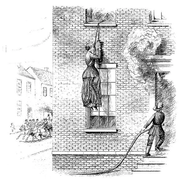 FIRE ESCAPE, 1884. A woman escaping from a burning building using a portable friction
