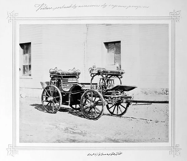 FIREFIGHTERs WAGON. An early fire wagon, possibly of French construction, used