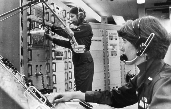 Two of the first women assigned duty as Air Force combat-ready missile crew members, Lieutenant Patricia Fornes (right) and Airman First Class Tina Ponzer. Both were assigned to a missile wing at McConnell Air Force Base in Wichita, Kansas. Photographed 1978
