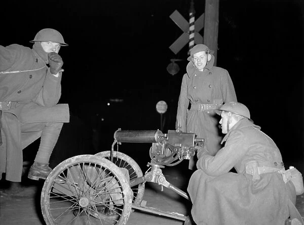 FLINT SIT DOWN STRIKE, 1937. National Guardsmen with machine gun outside of the