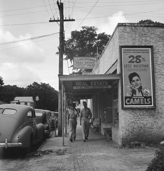 FLORIDA, 1941. American servicemen on the street in Starke, Florida. Photograph, 1941