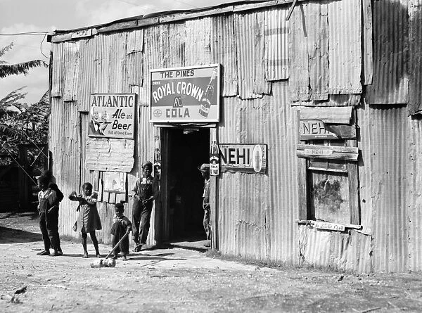FLORIDA: JUKE JOINT, 1941. A combination store, juke joint and boarding house for