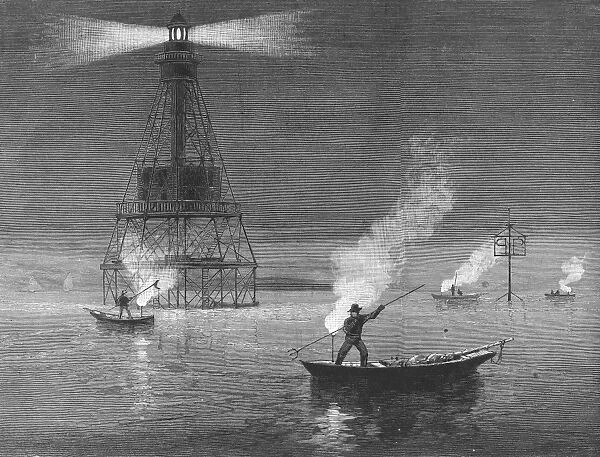 FLORIDA: NIGHT FISHING. Spear-fishing by firelight at Fowey Rocks Lighthouse, Biscayne Bay, Florida. Line engraving, 1886