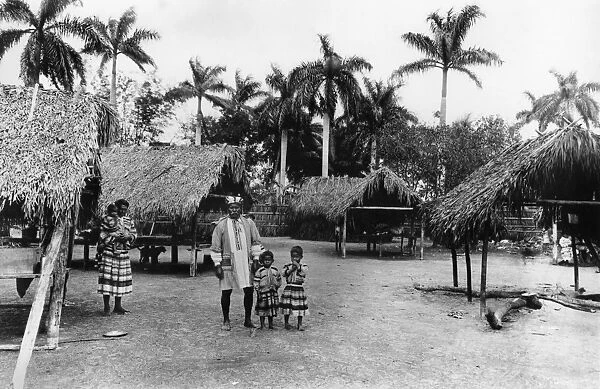 FLORIDA: SEMINOLE VILLAGE. A group of Seminole Native Americans at Musa Isle, a