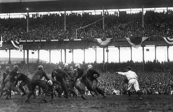 FOOTBALL GAME, 1925. Phil White of the New York Giants attempting to gain yards in a game against the Chicago Bears, at the Polo Grounds in New York City, 6 December 1925