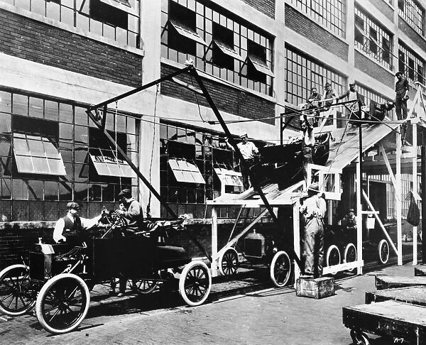 FORD ASSEMBLY LINE, 1913. The last stage of the Model T assembly line at the Ford