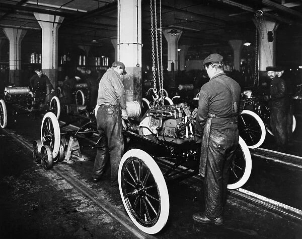 FORD ASSEMBLY LINE, c1913. The assembly line at the Ford automobile plant in Highland Park