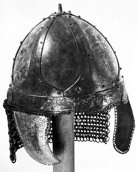 FRANKISH HELMET, c600 A. D. Bronze helmet found in a Frankish grave, c600 A. D