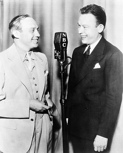 FRED ALLEN (1894-1956). American comedian. With fellow comedian Jack Benny, right
