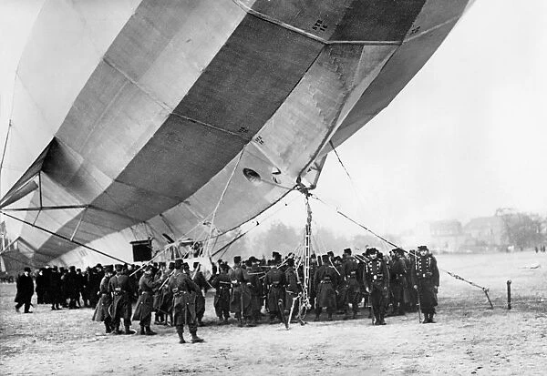 French soldiers inspect a Zeppelin dirigible which landed at Luneville, France in 1913, during World War I