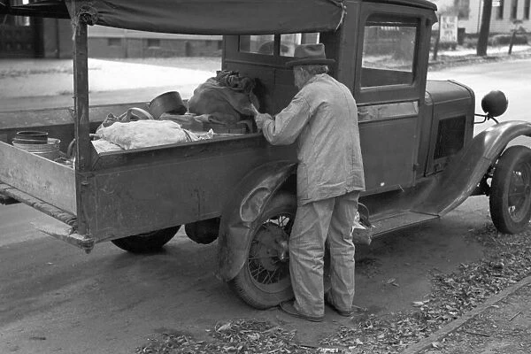 FRUIT VENDOR, 1939. A roadside fruit vendor, Meriden, Connecticut. Photograph by Russell Lee