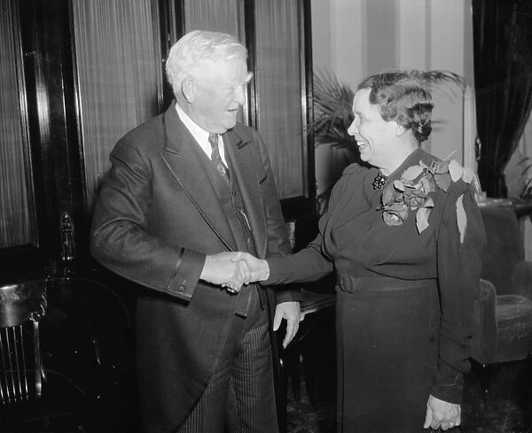 GARNER AND CARAWAY, 1939. Vice President John Nance Garner congratulates Senator Hattie Caraway on her reelection, January 1939