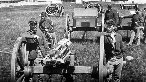 GATLING GUN, 1870s. A Gatling gun battery at Fort Lincoln, Dakota Territory, in
