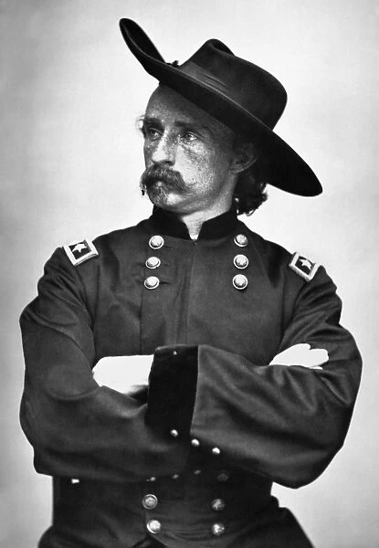 GEORGE CUSTER (1839-1876). American army officer. Photographed during the Civil War in the uniform of a Union Army major general