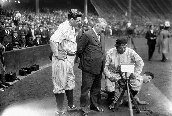 GEORGE H. RUTH (1895-1948). Known as Babe Ruth. American professional baseball player for the New York Yankees. Ruth (left) photographed with New York Giants manager John McGraw, with Nick Altrock and Al Schacht doing a comedy routine during the World Series, October 1923