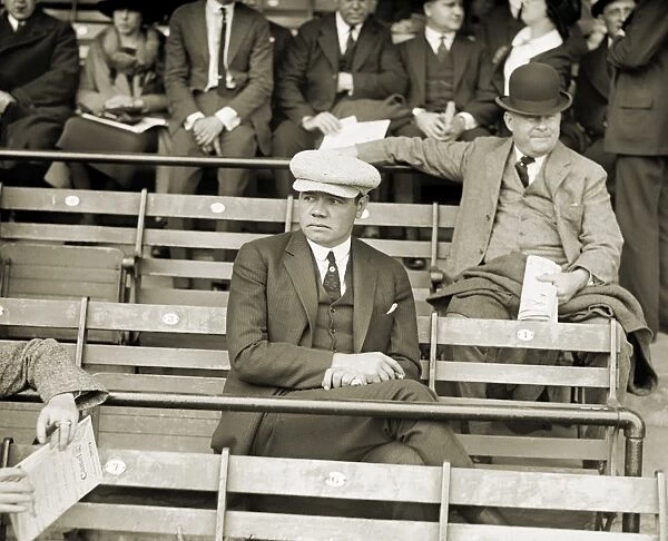 GEORGE H. RUTH (1895-1948). Known as Babe Ruth. American professional baseball player. Photographed in a stadium, c1922