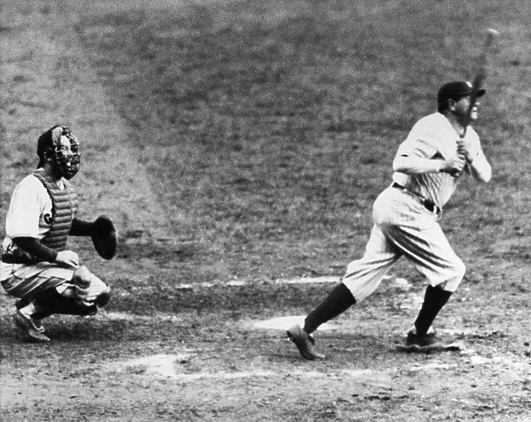 GEORGE H. RUTH (1895-1948). Known as Babe Ruth. American baseball player. Batting against the Chicago Cubs in Game 2 of the 1932 World Series at Yankee Stadium in the Bronx, New York City, 29 September 1932. Catcher Gabby Hartnett of the Cubs watches at left