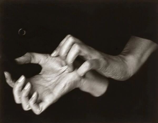 GEORGIA O KEEFFE (1887-1986). American painter. O Keeffes hands photographed by Alfred Stieglitz, 1918