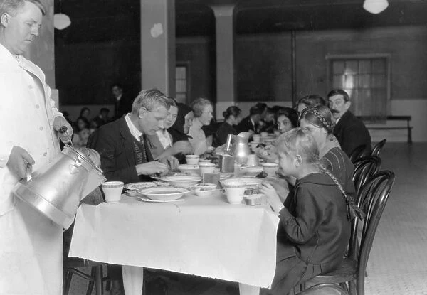 GERMAN IMMIGRANTS, 1920. German immigrants in a dining hall