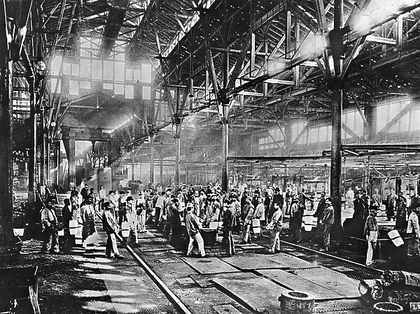 GERMANY: KRUPP WORKS. Workers making a casting of crucible steel at Krupp Bessemer
