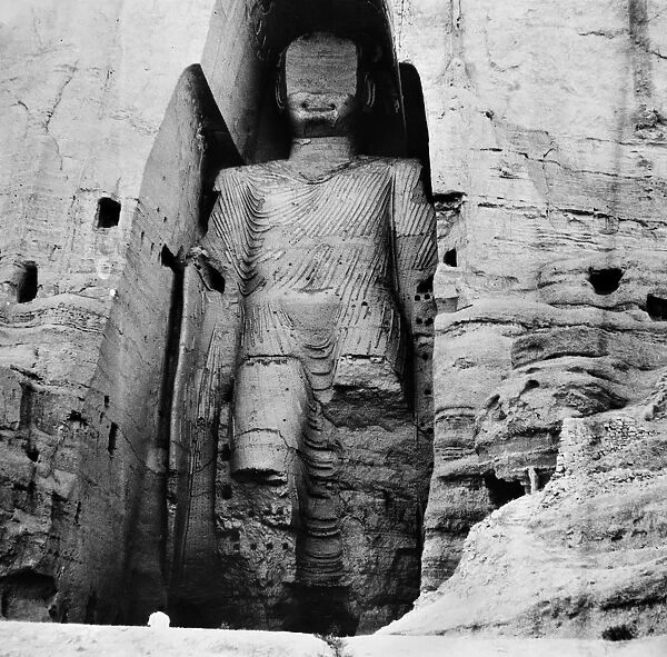 One of the two giant statues of Buddha carved in a cliff at Bamyan, Afghanistan. Sixth century, Gandhara. The figures were dynamited in 2001 by the Taliban. Photograph, mid-20th century