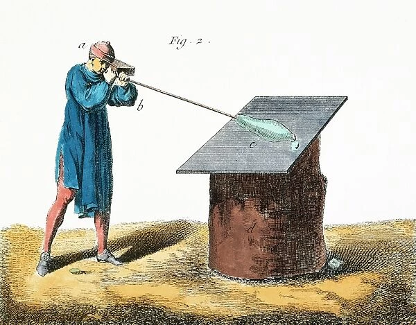 GLASSBLOWER, 18th CENTURY. An 18th century glassblower begins to blow the glass after the second heat. Copper engraving, French, 18th century