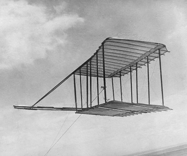 Glider invented by Orville and Wilbur Wright, being flown as a kite in Kitty Hawk, North Carolina, 1900