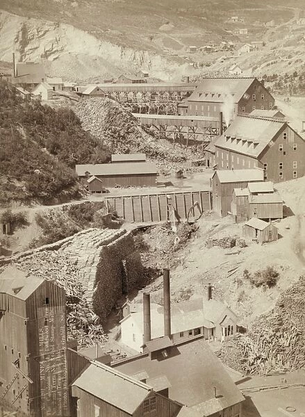 GOLD STAMP MILLS, 1888. Caledonia and Deadwood gold stamp mills at Terraville, South Dakota