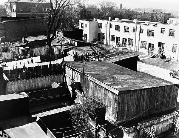 A government low-cost housing project next to slum dwellings in southwestern Washington State, late 1930s