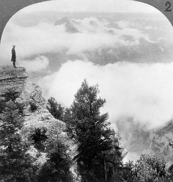 GRAND CANYON, c1929. A man overlooking clouds from Bright Angel Point in the Grand