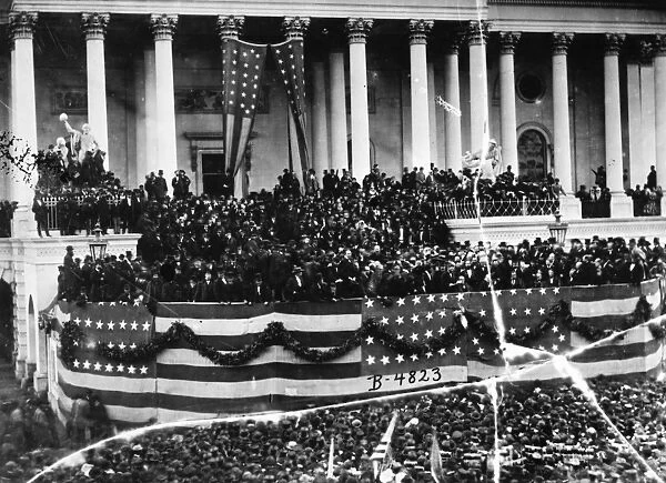 GRANT INAUGURATION, 1873. President Ulysses S. Grant delivering his inaugural address on the east portico of the U. S. Capitol, 4 March 1873. Photograph by Mathew Brady, 1873