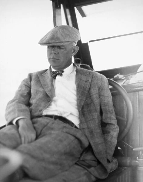 GRANTLAND RICE (1880-1954). American sportswriter. Photographed in 1928