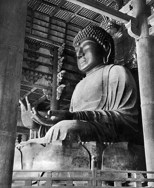The Great Buddha, gilt-bronze, in the hall of the Todaiji Temple at Nara. Japan. Photograph, c1970s