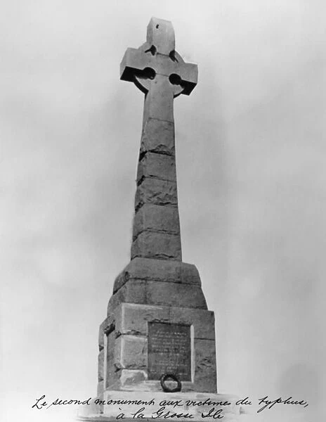 GROSSE ILE: MONUMENT, 1909. A monument dedicated to the Irish immigrants who died