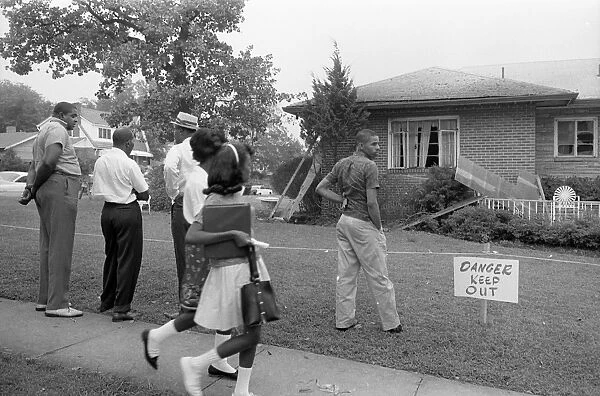 Group of African Americans viewing the bomb-damaged home of Arthur Shores, NaCP attorney, Birmingham, Alabama. Photographed by Marion Trikosko, 5 September 1963