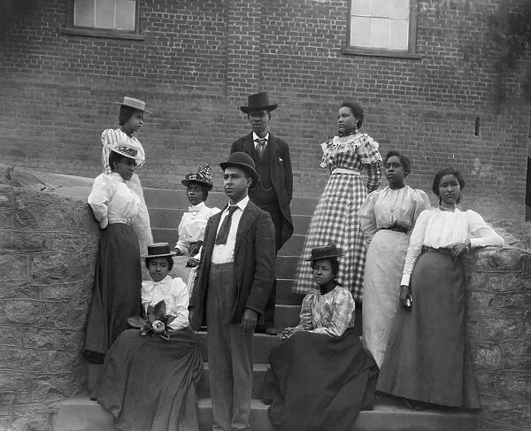 GROUP PORTRAIT, c1899. Group portrait of African-American men and women in Georgia