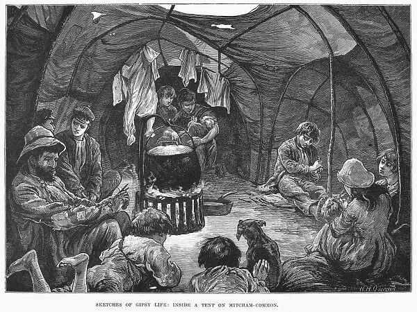 GYPSY ENCAMPMENT, 1879. Inside a gypsy tent at a camp at Mitcham Common, South London