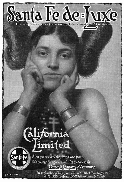 HAIRSTYLE: HOPI, 1911. American advertisement for the Atchison, Topeka and Santa Fe Railways California Limited train service between Chicago and Los Angeles, 1911, featuring a young woman wearing her hair in the style of a Hopi maiden