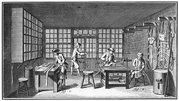 HARNESS-MAKER, 18th CENTURY. A harness-making shop, with workers cutting, punching