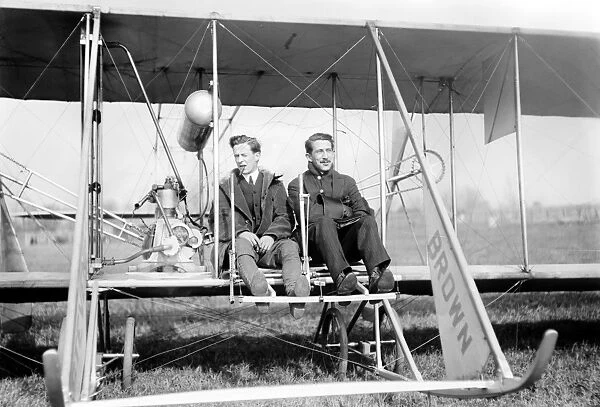 Harry Bingham Brown. American early aviator. Photographed seated in his airplane with a passenger on 14 July 1907