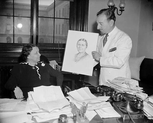 HATTIE CARAWAY (1878-1950). American senator from Arkansas. Artist Edward Solto presents Hattie Caraway with her official reelection campaign picture, 13 June 1938