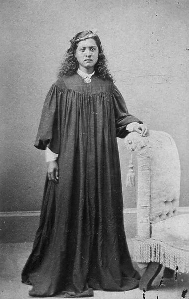 HAWAIIAN DRESS, 1870s. A Hawaiian woman clothed in the muu-muu adapted from the