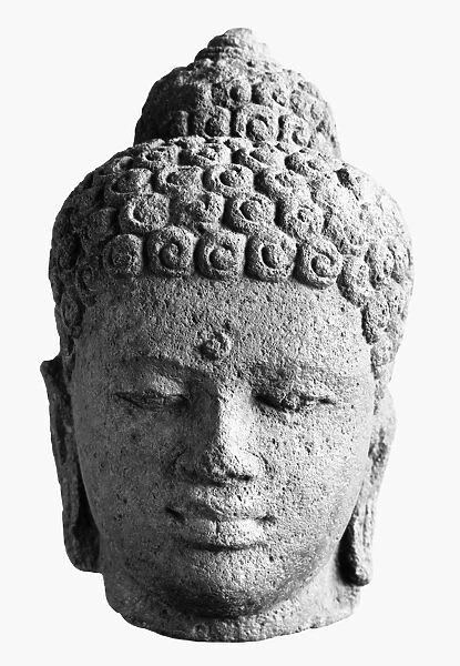 Head of Buddha. Javanese sculpture made from volcanic rock, Sailendra Dynasty, 9th century A. D
