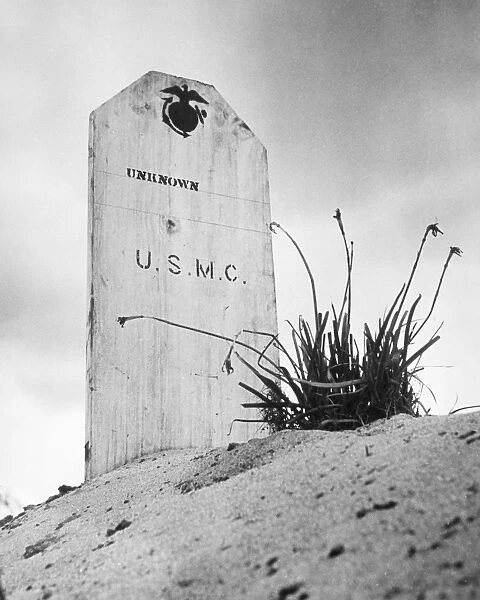 Headstone for an unidentified U. S. Marine killed on the island of Saipan, part of the Mariana Islands. Photographed 1944