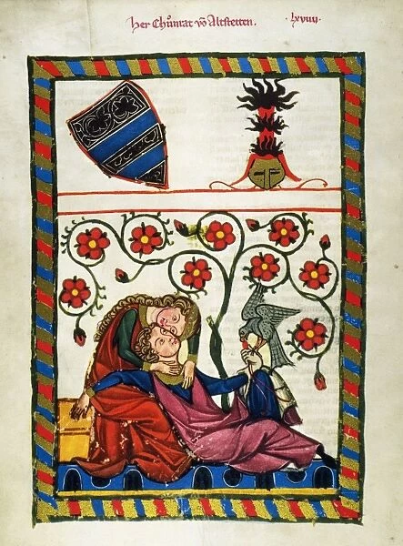 HEIDELBERG LIEDER, 14th C. The minnesinger Konrad von Altstetten in the arms of his lady-love and feeding a falcon. Early 14th century Heidelberg Lieder manuscript illumination