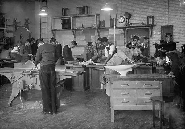 HIGH SCHOOL CLASS, 1939. Students at work in a carpentry shop class at Anacostia