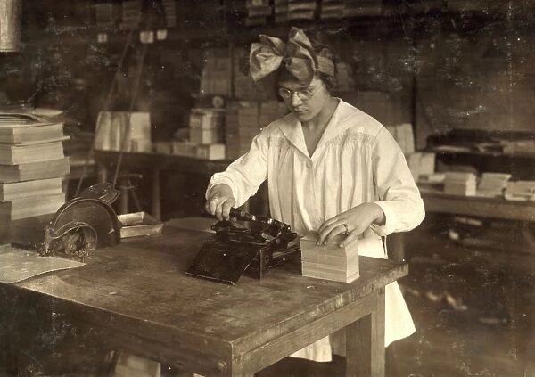 HINE: BOSTON INDEX CARD CO. A girl stamping labels at the Boston Index Card Co