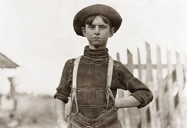 HINE: CHILD LABOR, 1908. Portrait of 12 year old Johns Lewis, a cotton mill employee