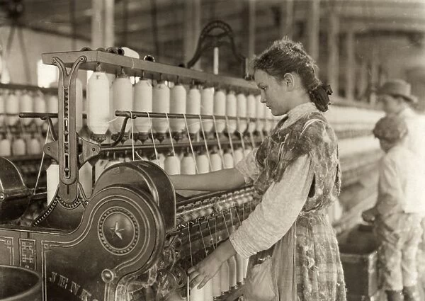 HINE: CHILD LABOR, 1908. A young spinner working in Vivian Cotton Mills in Cherryville