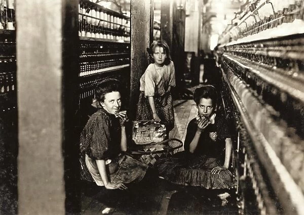 HINE: CHILD LABOR, 1908. Young workers eating their lunch on the floor between